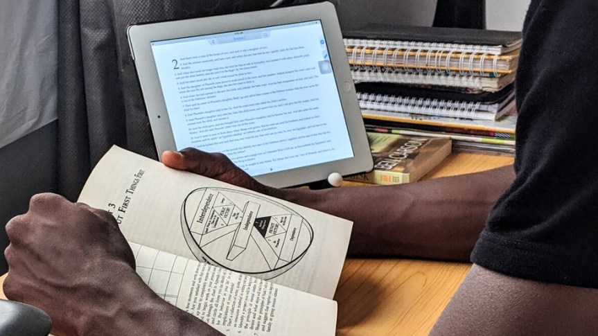 person reading on book